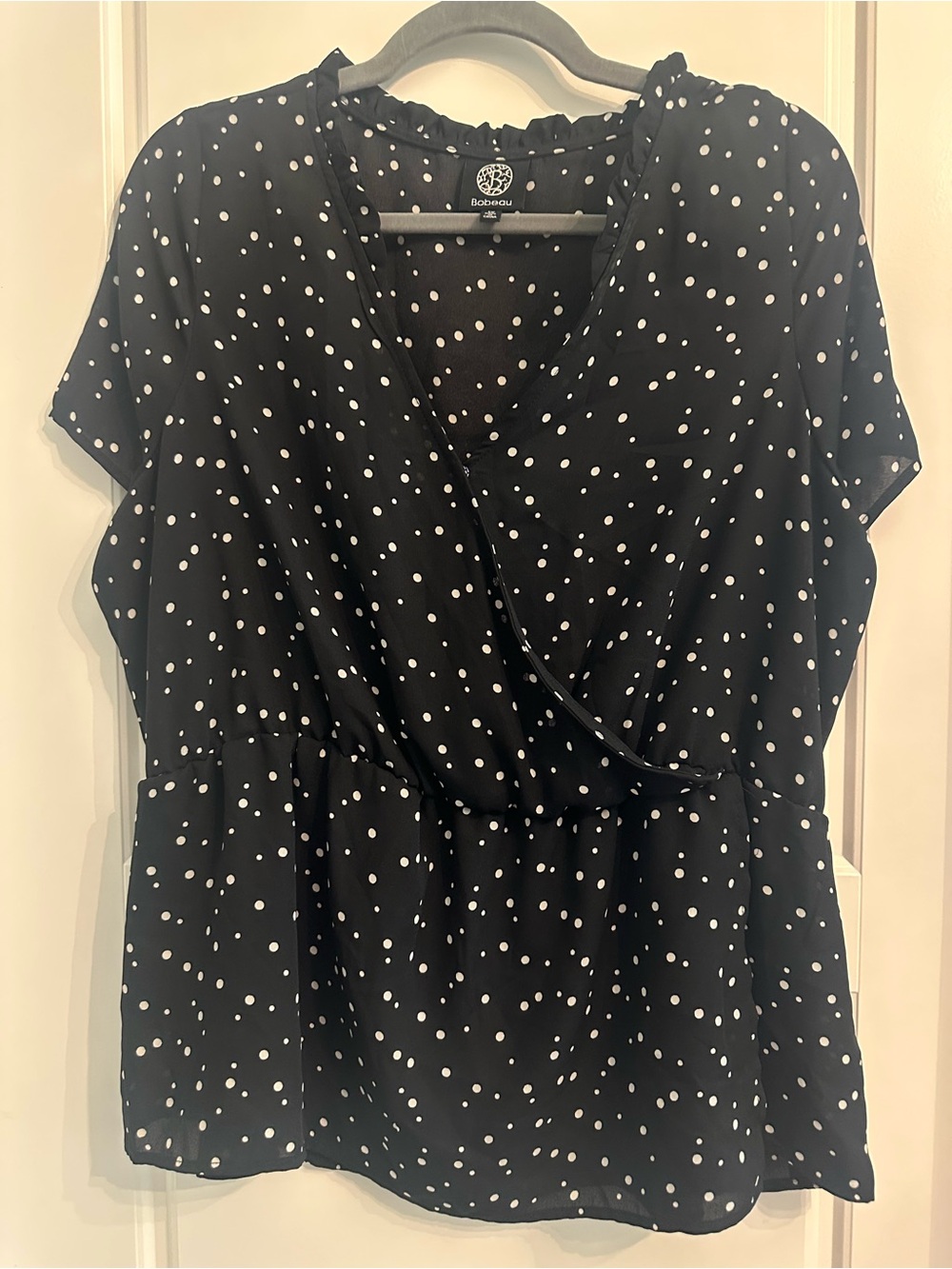 Bobeau Black Polka Dot Wrap-Style Blouse and slight peplum waistline